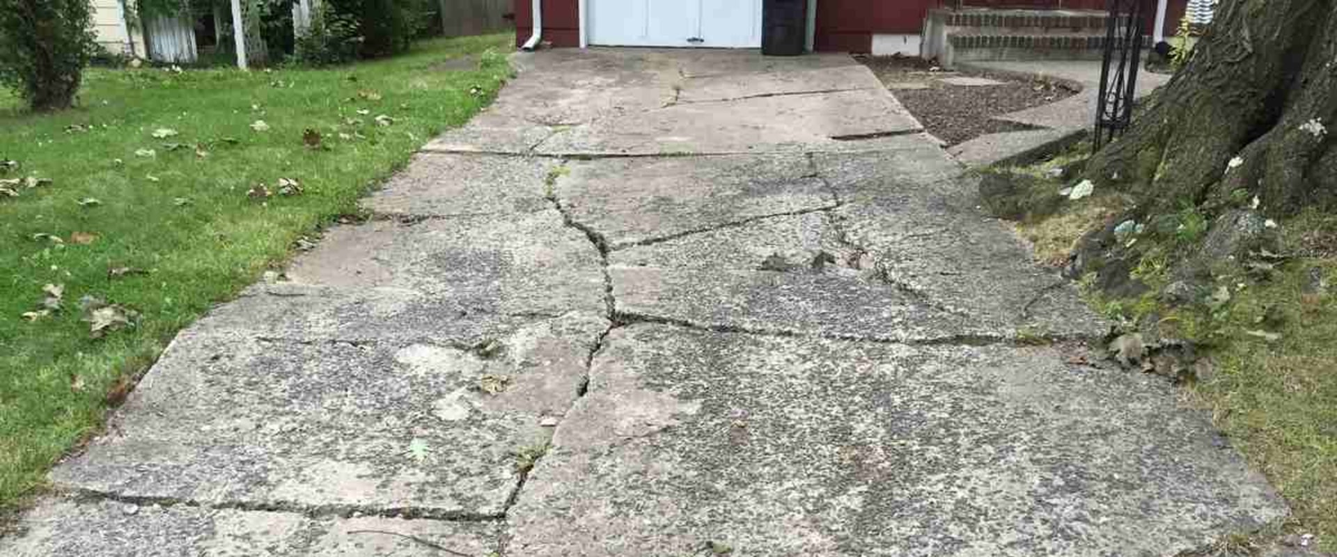 Why to repair concrete driveway cracks?