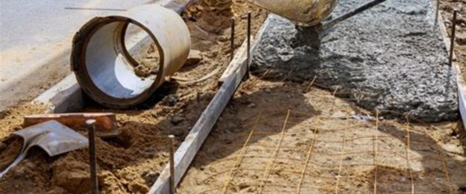 How Roofing Services Support Better Drainage Around Concrete Installations