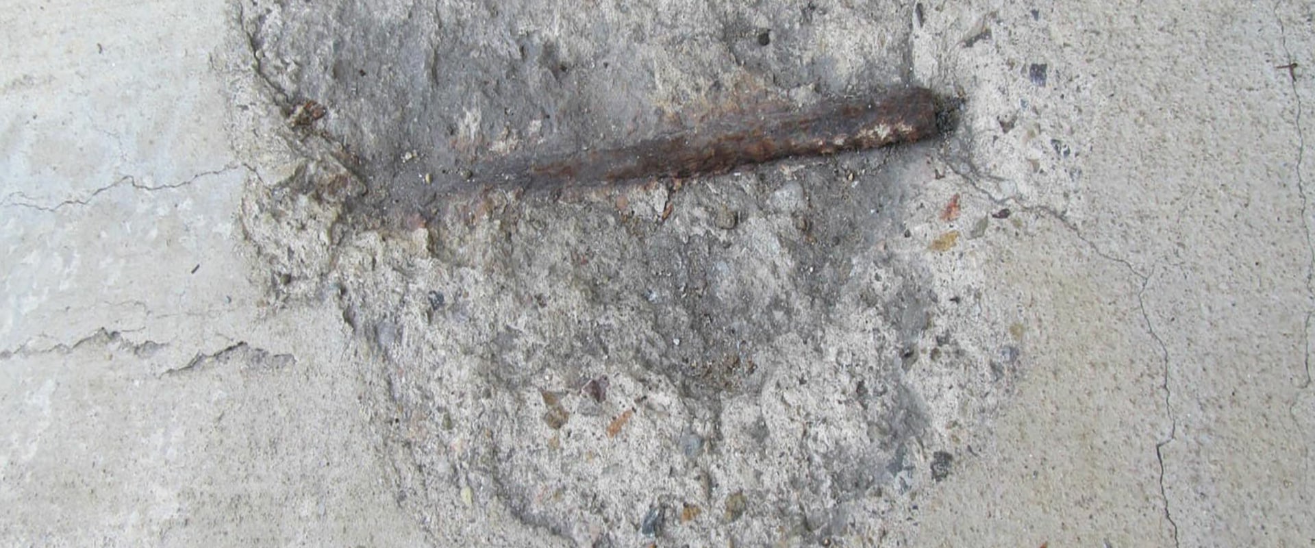 How to repair concrete with exposed rebar?