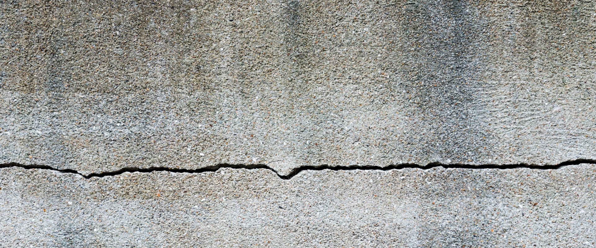 How do you resurface old concrete walls?