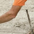 How do you pour concrete over existing concrete?