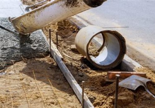 How Roofing Services Support Better Drainage Around Concrete Installations